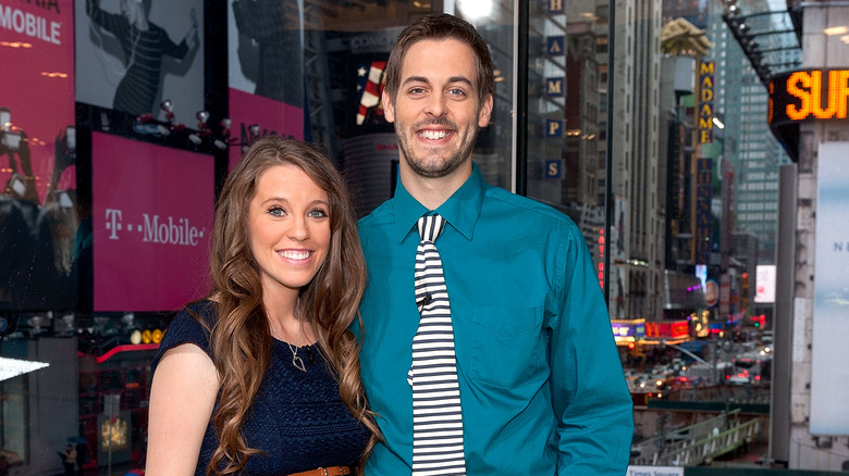 Jill Duggar Dillard and Derick Dillard posing together