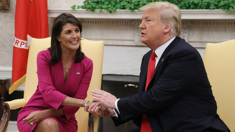 Donald Trump patting Nikki Haley's hand