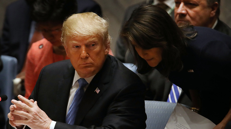 nikki haley and donald trump speaking at meeting