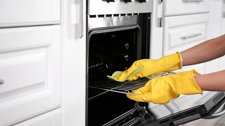 https://www.thelist.com/img/gallery/how-often-should-you-be-cleaning-your-oven/cleaning-your-oven-on-a-regular-schedule-is-vital-1657125037.jpg
