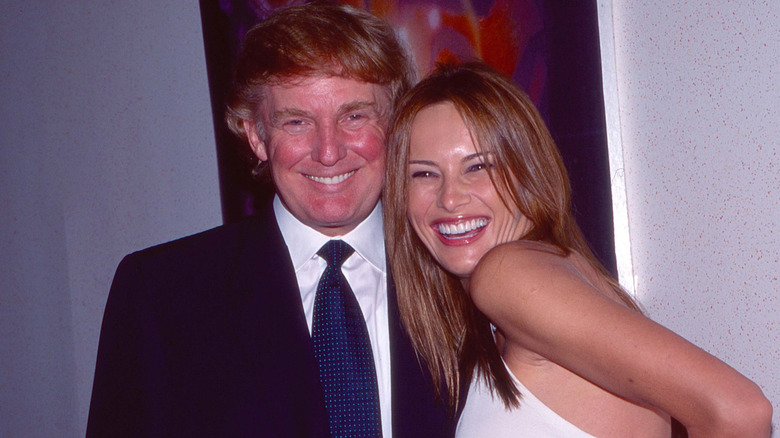 Donald Trump and Melania Trump smile at a premiere of 'Star Wars: Episode I - the Phantom Menace' in New York City (1999)