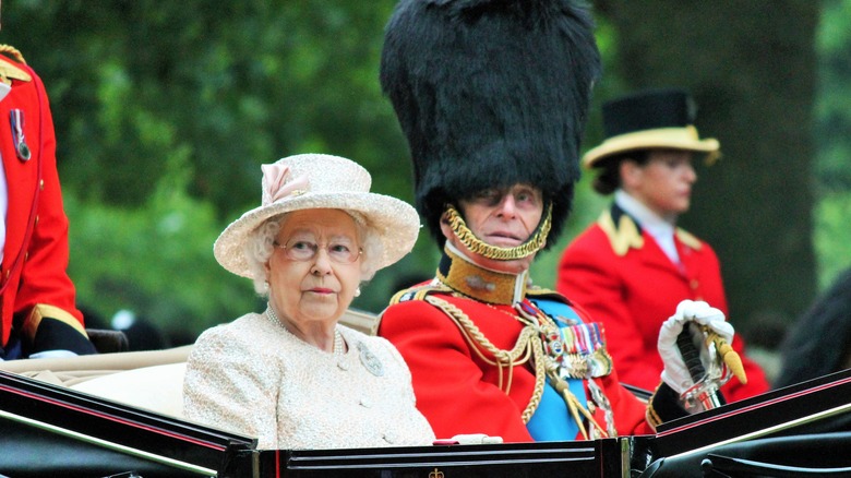 Queen Elizabeth and Prince Philip in carriage