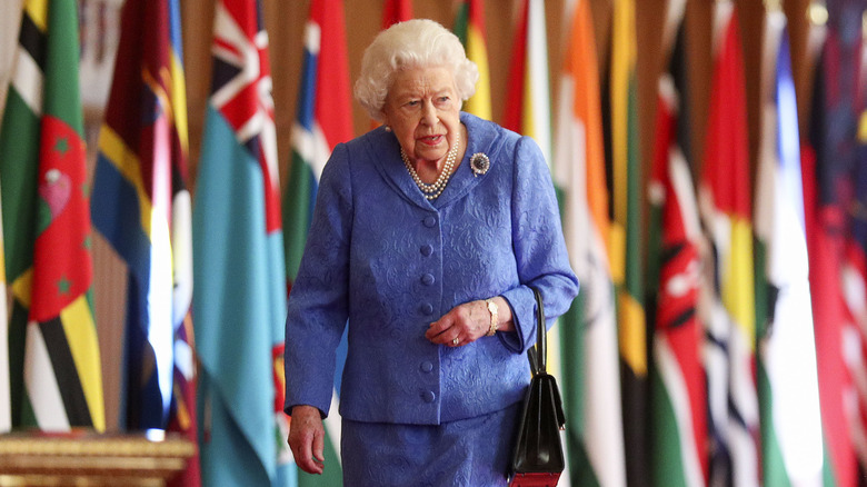 Queen Elizabeth walking in Windsor Castle