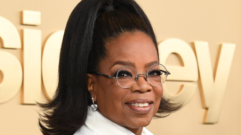 Oprah smiling on the red carpet 