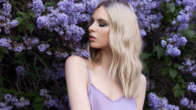 Woman in lilac top