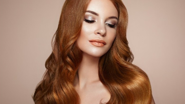 Woman with wavy red hair