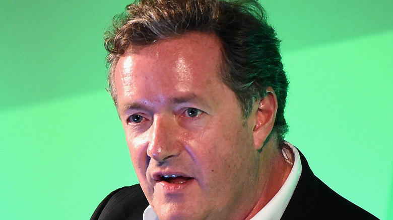 Piers Morgan looks dumbfounded onstage