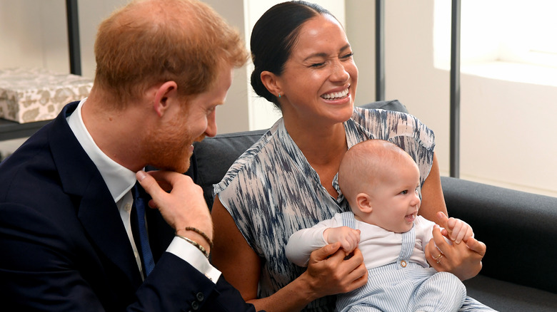 Prince Harry, Meghan Markle, and Archie sitting together