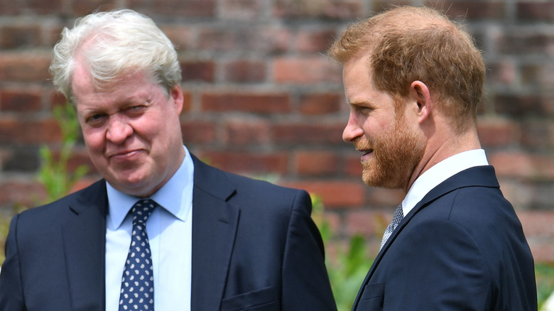 Charles Spencer talking with Prince Harry