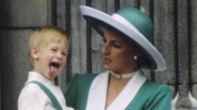 Princess Diana holding Prince Harry