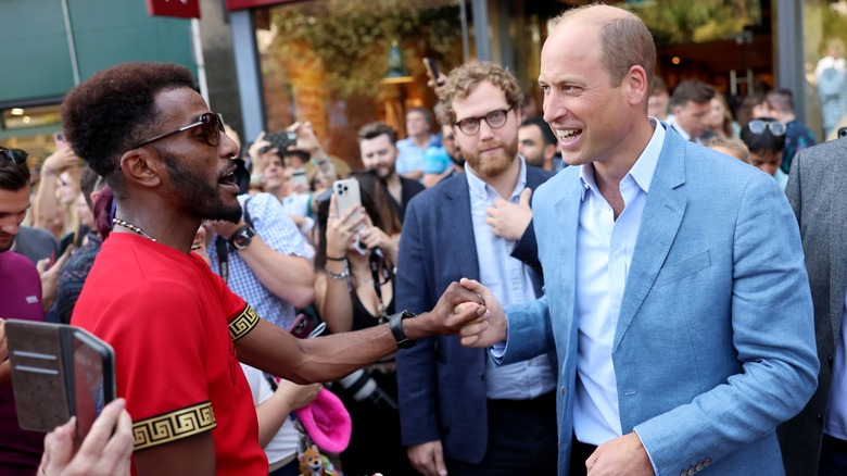 Prince William meeting members of the public while promoting Homewards