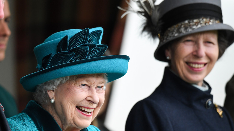 Queen Elizabeth and Princess Anne smiling