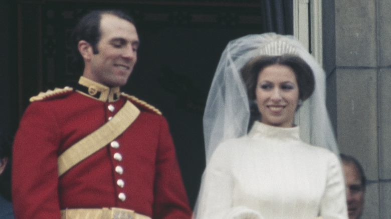 Anne, the Princess Royal and Mark Phillips pose on the balcony of Buckingham Palace in London, UK, after their wedding