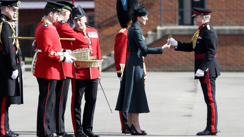 Kate Middleton handing shamrocks to the Irish Guard on St. Patrick's Day