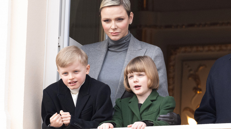 Princess Charlene and twins on balcony