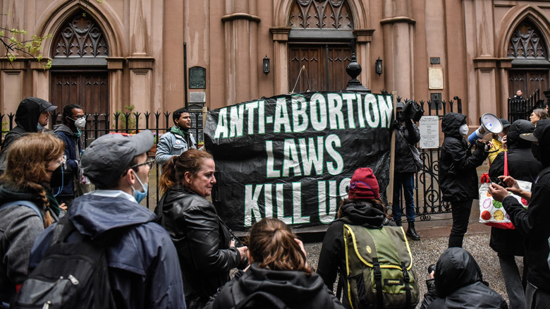 Abortion rights activists outside a Catholic church