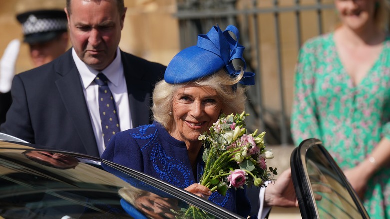 Queen Camilla smiling at the camera 