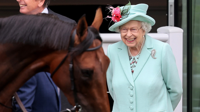Queen Elizabeth smiling at the Royal Ascot