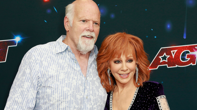 Rex Linn and Reba McEntire smiling