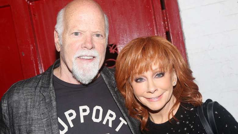 Rex Linn and Reba McEntire smiling