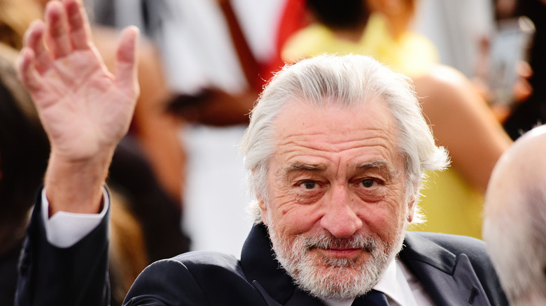 Robert De Niro waves