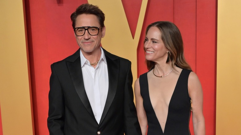 Susan Downey smiling at Robert Downey Jr. 