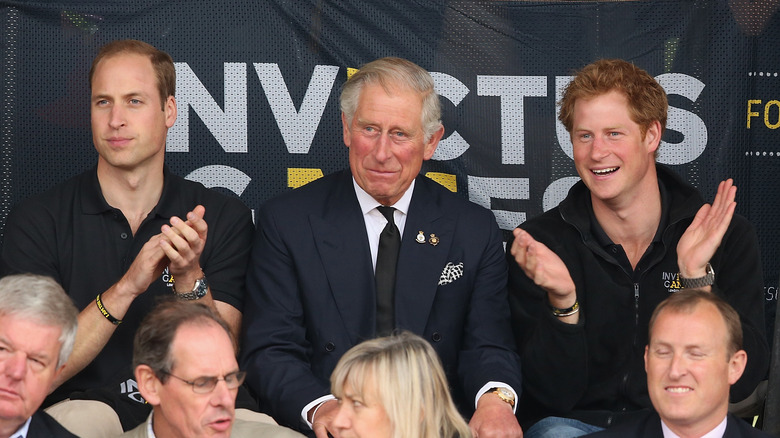 Princes William, Charles, Harry clapping