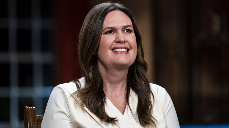 Sarah Huckabee Sanders smiling during speech