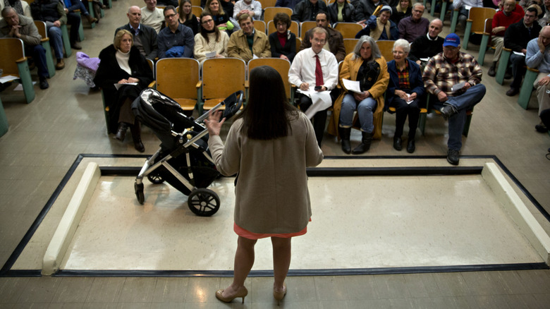 Sarah Huckabee Sanders speaking in auditorium