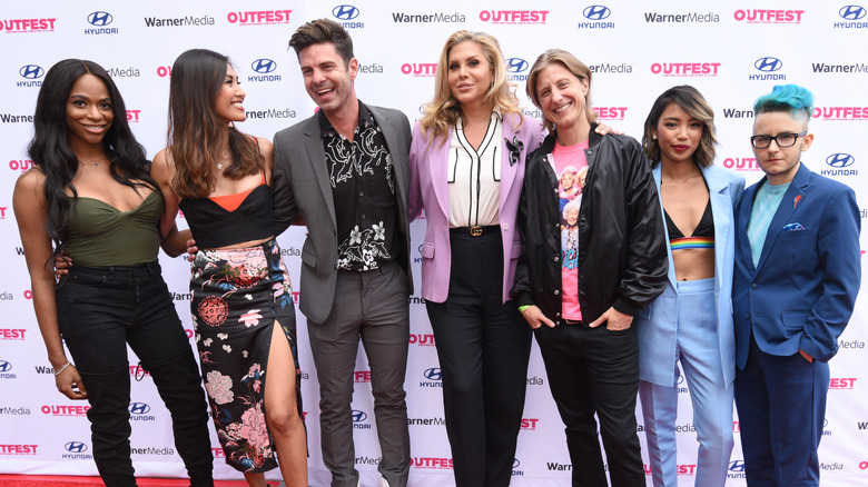 Schofield poses with other activists on the Outfest red carpet