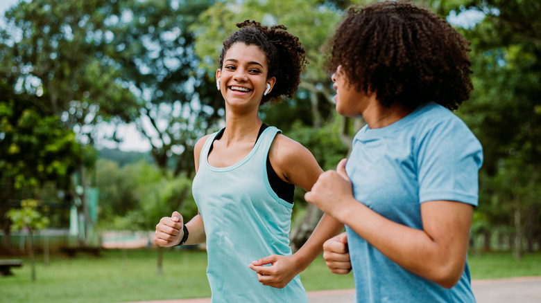 Two people exercising together