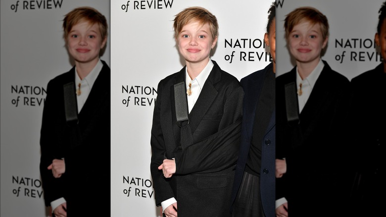 younger Shiloh Jolie-Pitt wearing a suit