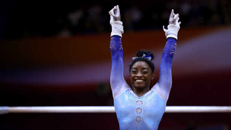 Simone Biles competing in gymnastics