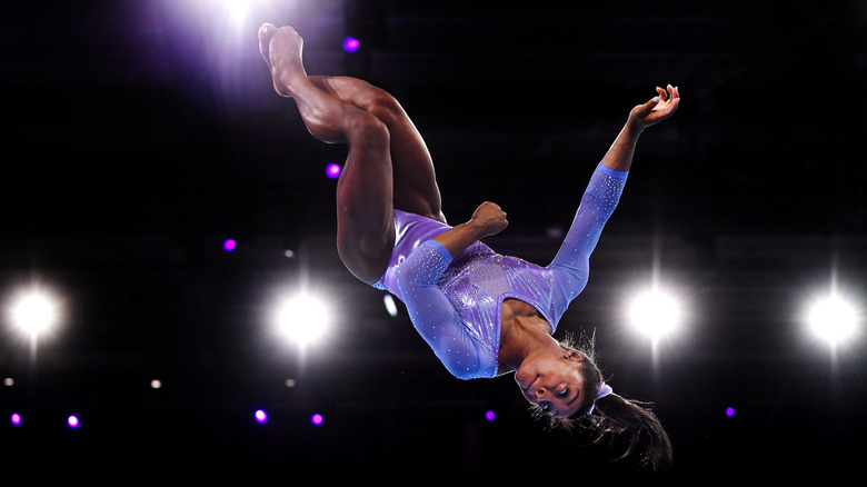 Simone Biles competing in gymnastics