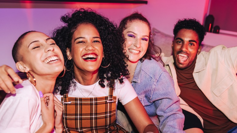 Group of Gen Z BIPOC friends smiling 