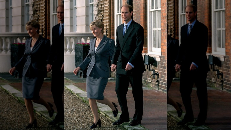 Prince Edward and Sophie outside brick house in '90s