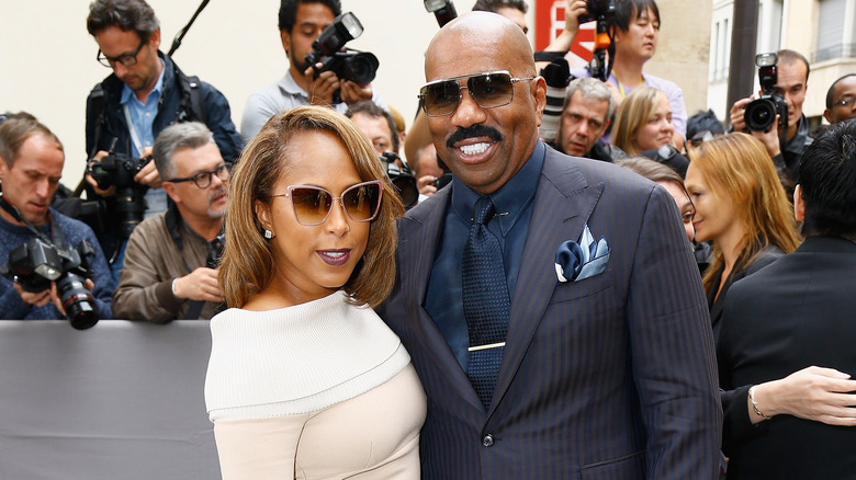 Marjorie and Steve Harvey posing