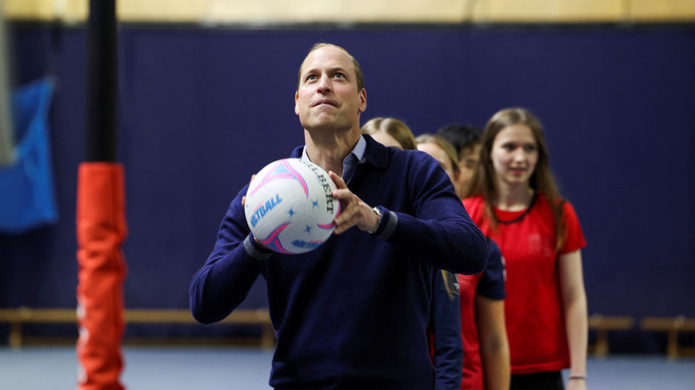 Prince William in a game of netball during a 2023 SportsAid workshop