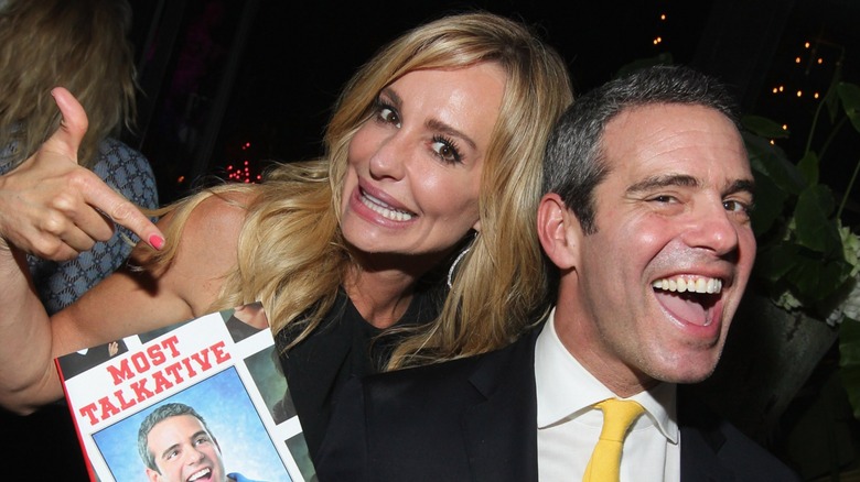 Taylor Armstrong and Andy Cohen smiling