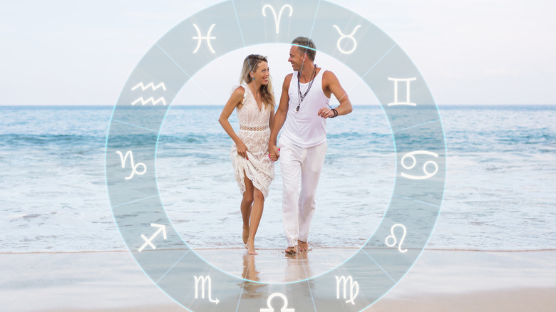 A couple and a zodiac wheel 