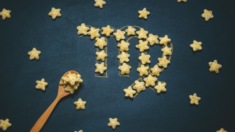 Virgo symbol made of gold stars 