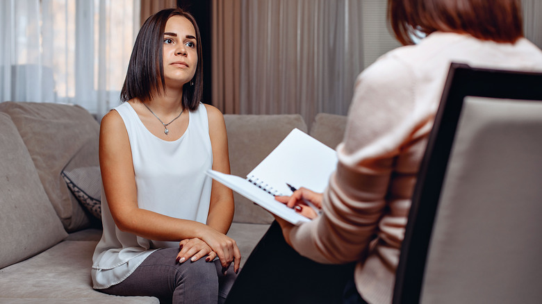 woman talking to therapist