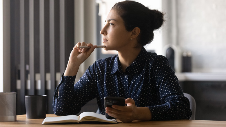 A woman making a list 