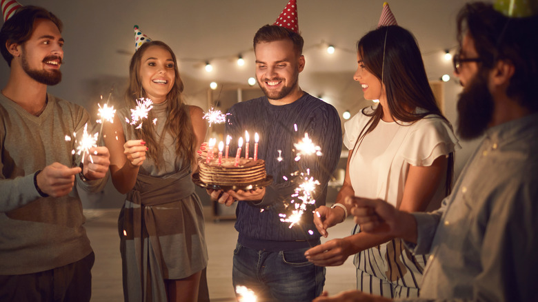 Group of friends celebrating birthday 