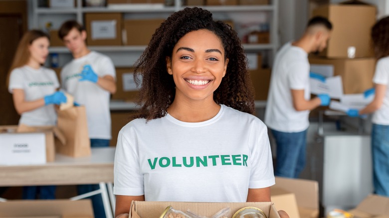 A woman volunteering in her community. 