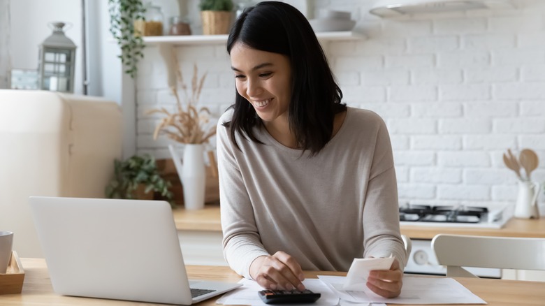 woman happy with her paycheck