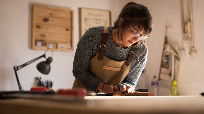 A woman crafting. 