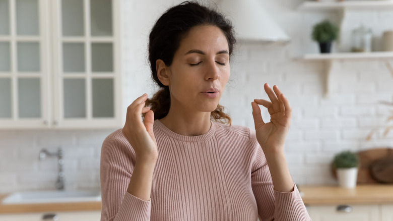 A woman meditating. 