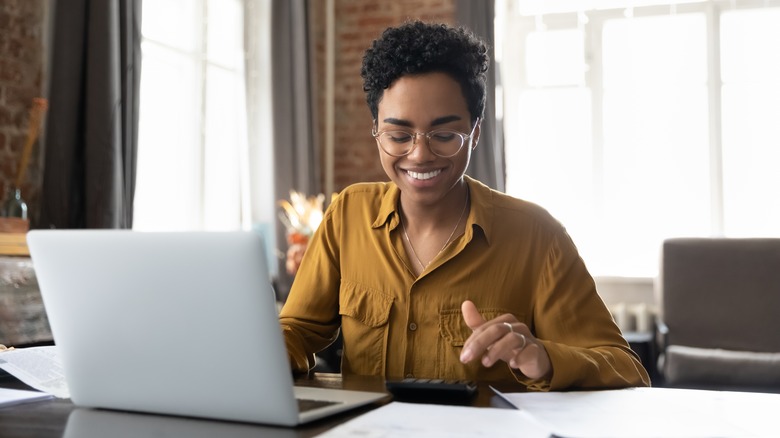 Woman working from home on her computer