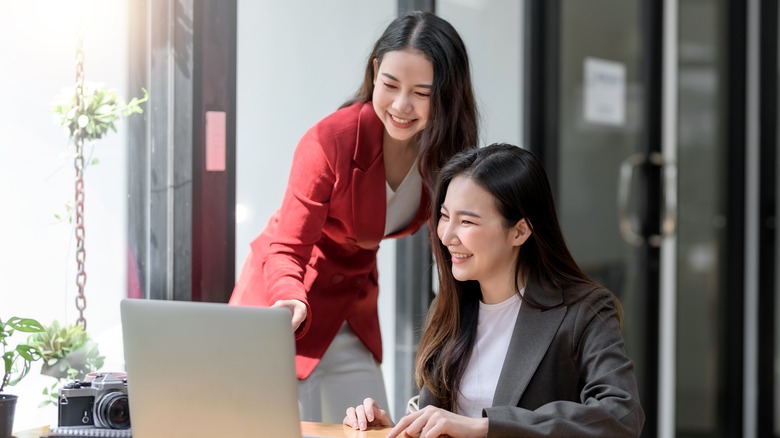 Two women in an office. 